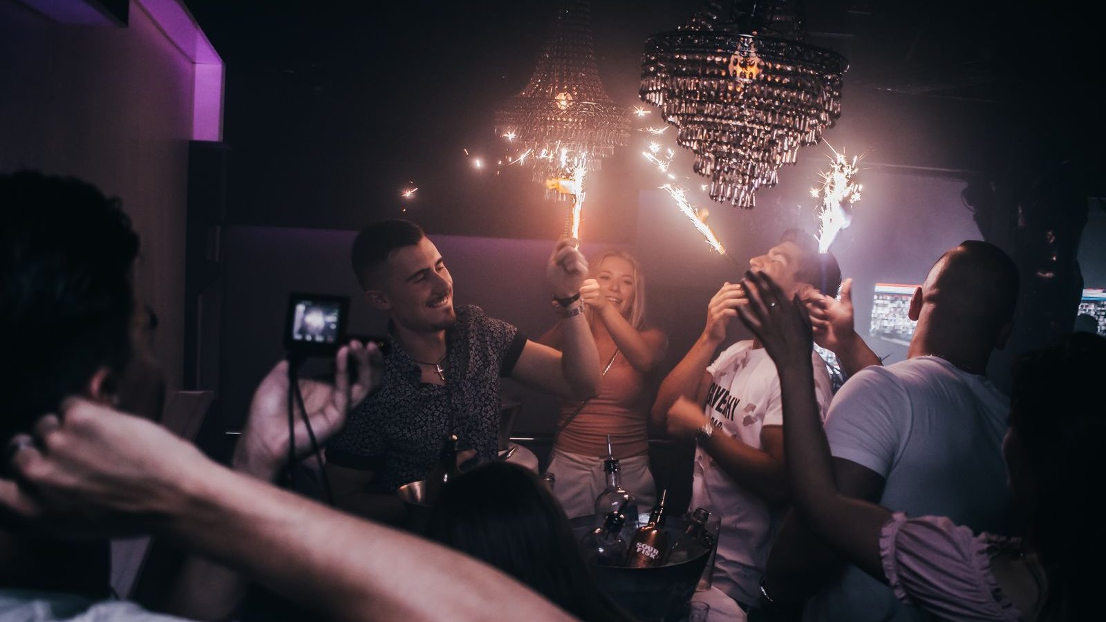 Sparklers lit at a VIP table in a Las Vegas nightclub
